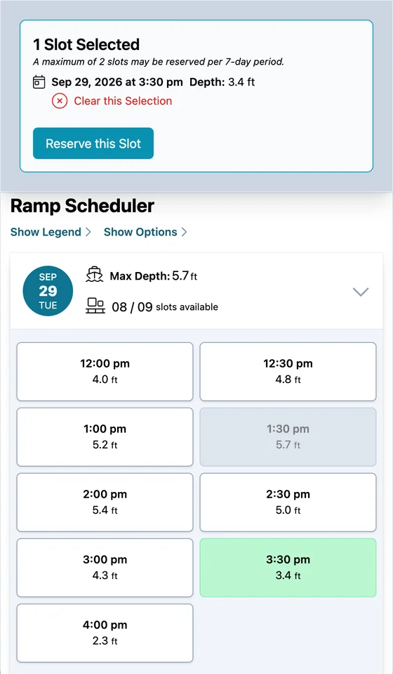 The app on a phone for Tuesday, September 29, 8 of 9 slots available: nine large buttons from 12:00 to 4:00 pm, each with its water depth, the 1:30 pm button grayed out as booked, and 3:30 pm selected in green. A card at the top confirms the selection, notes that a maximum of 2 slots may be reserved per 7-day period, and offers a Reserve this Slot button.